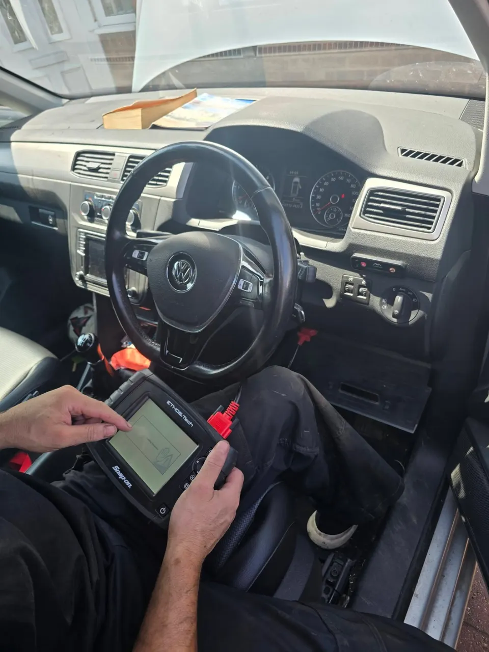 Diagnostic scanner inside a VW Caddy in Redditch